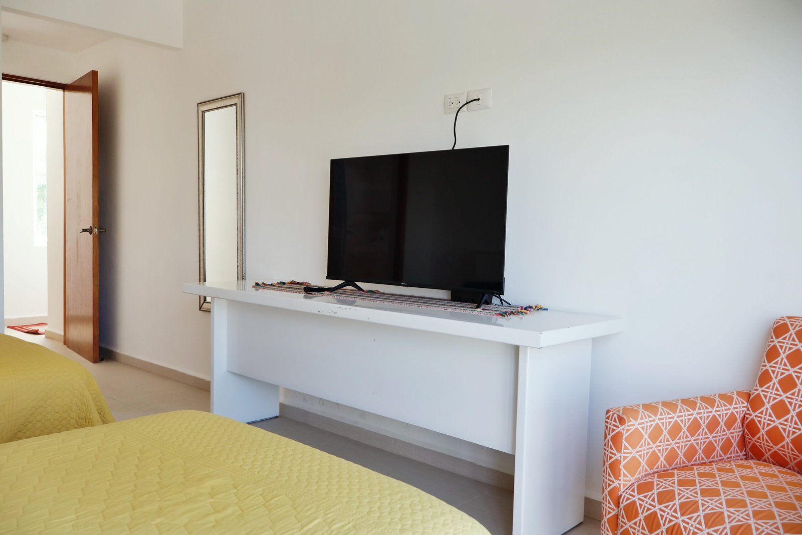 Smart TV and desk in the Twin Balcony Suite