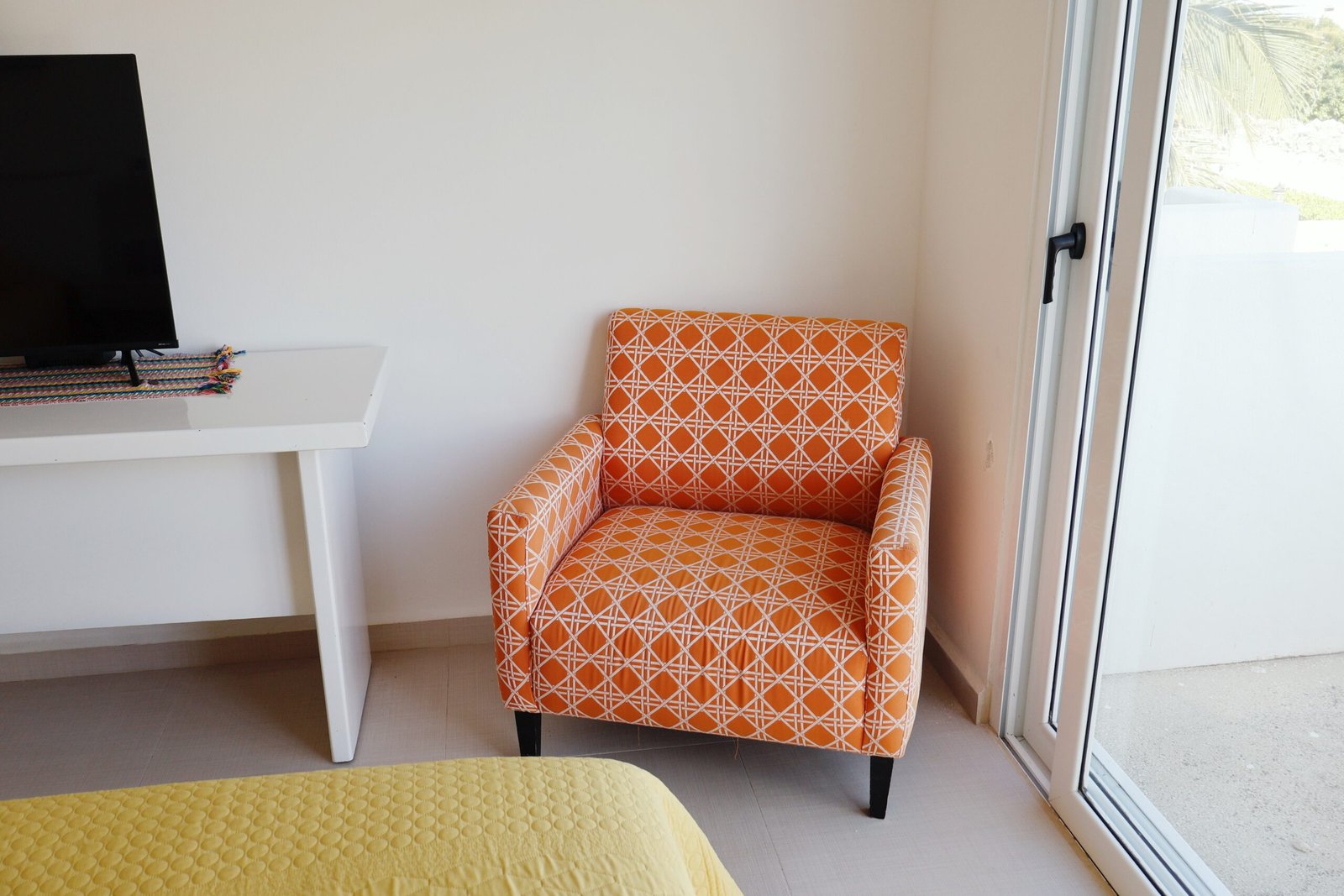 Armchair and balcony access